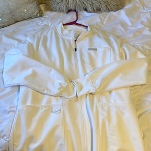 White jaanuu scrub jacket